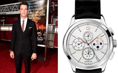 Decent Miles Teller selects black suits and stainless steel fake Montblanc.