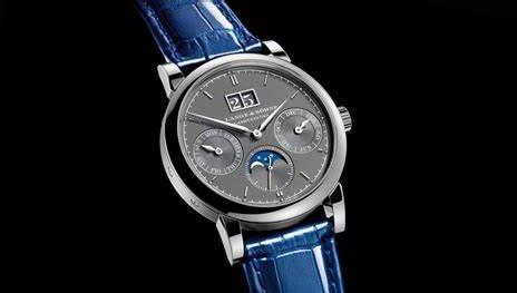 The grey dial fake watch has blue strap.